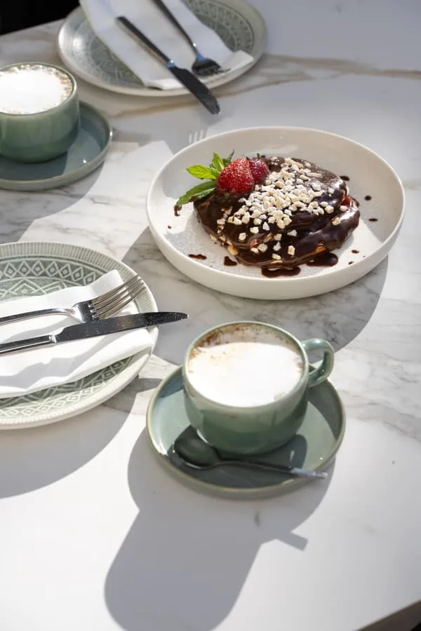 A sweet and a cappuccino