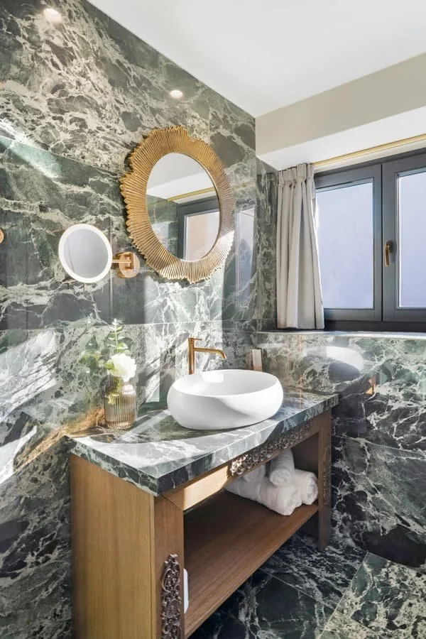 A bathroom in green marble