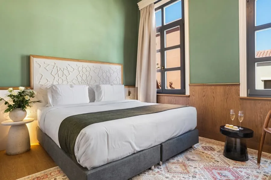 A bed in the light of the window